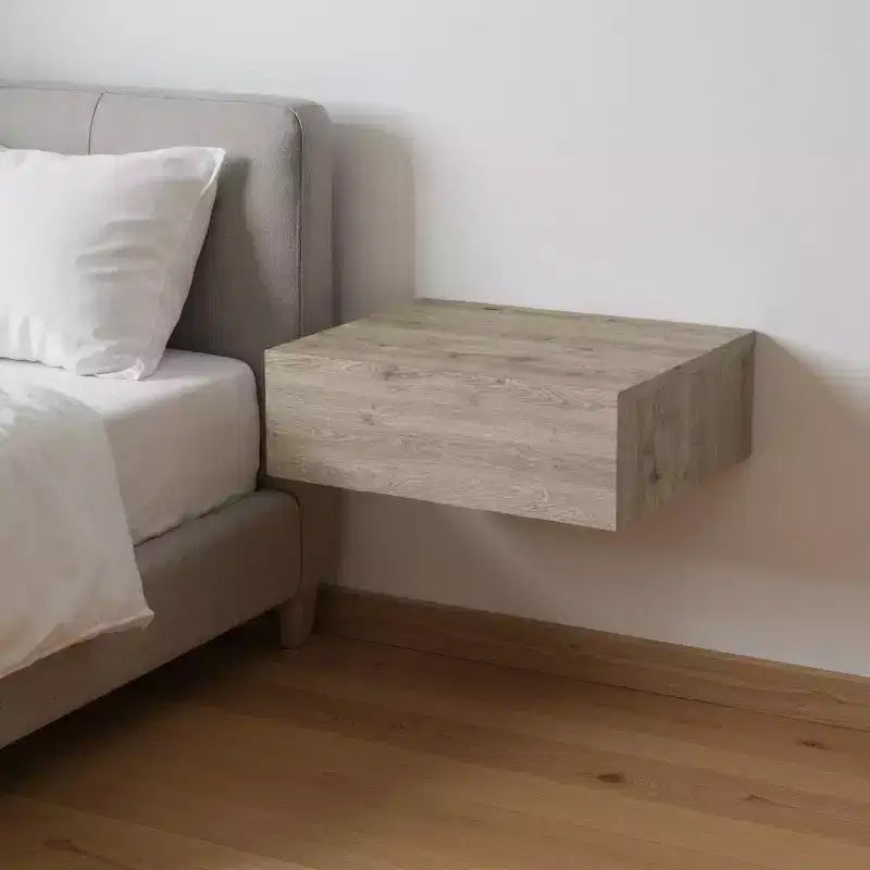 Comodino flottante con un cassetto in legno grigio