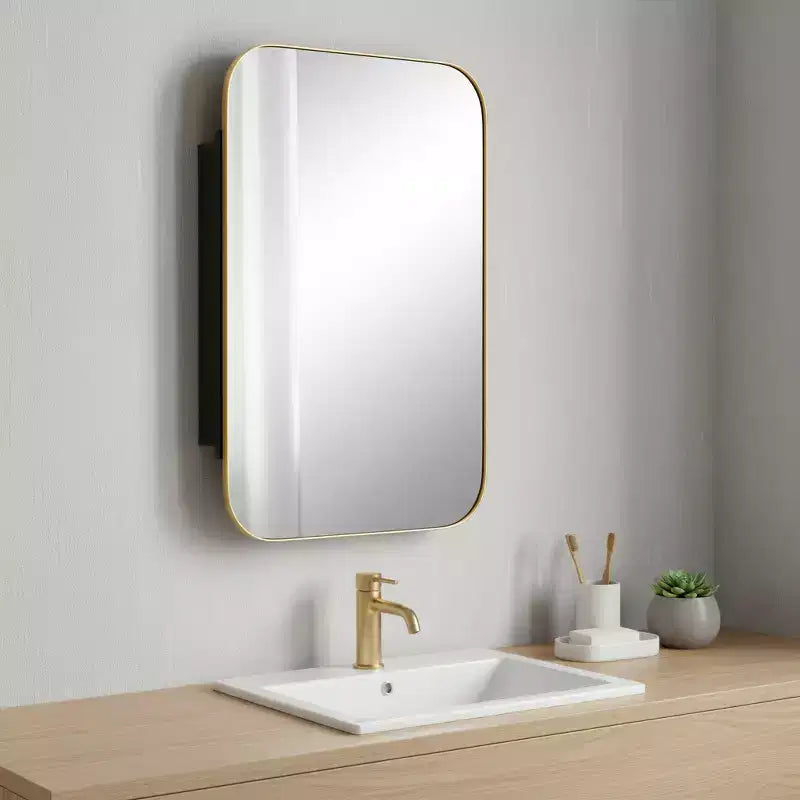 Specchio da bagno con mobile e cornice in metallo dorato